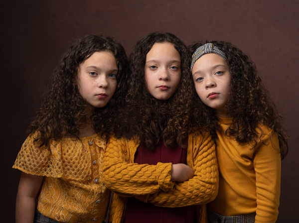 triplets with dark curly hair fine art photography