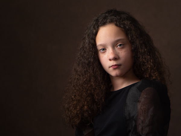 girl with dark curly hair fine art photography session