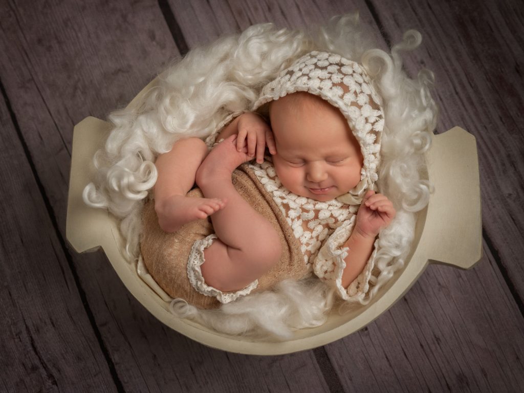 newborn baby in bowl newborn photography