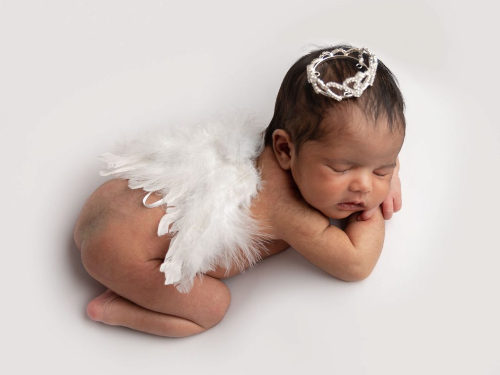 newborn baby dressed as an angel