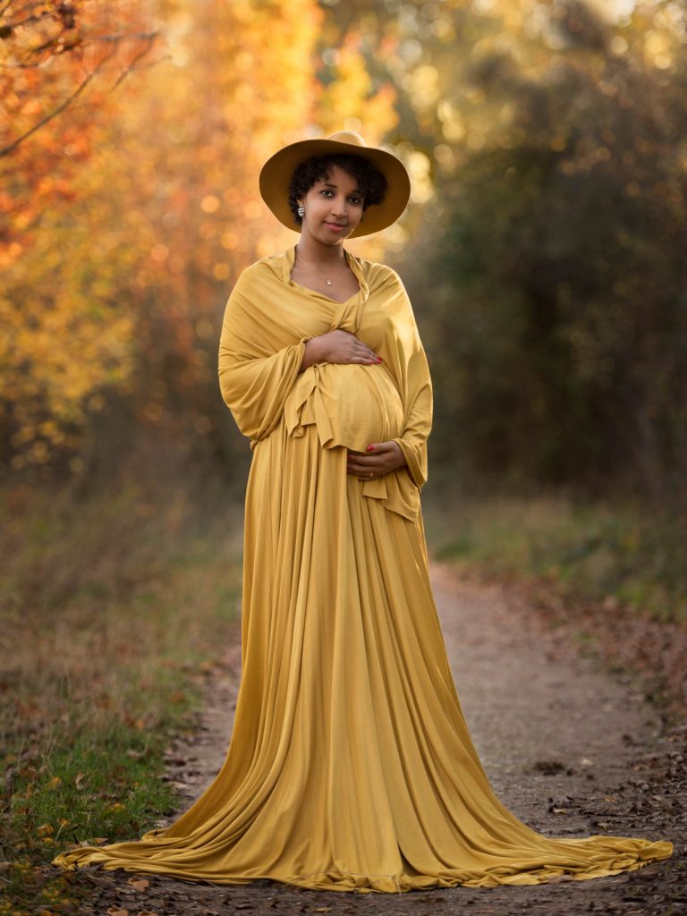 outdoor, yellow dress and hat maternity photoshoot
