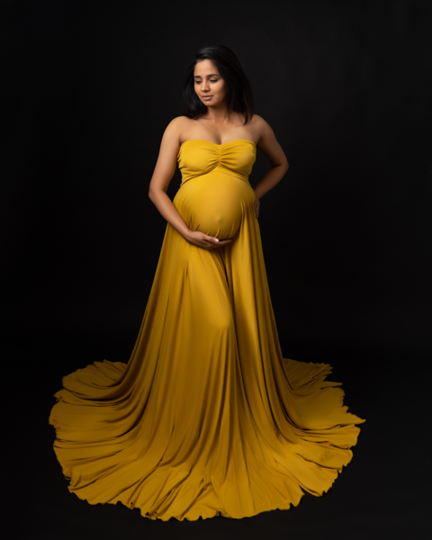 pregnant mom in mustard dress