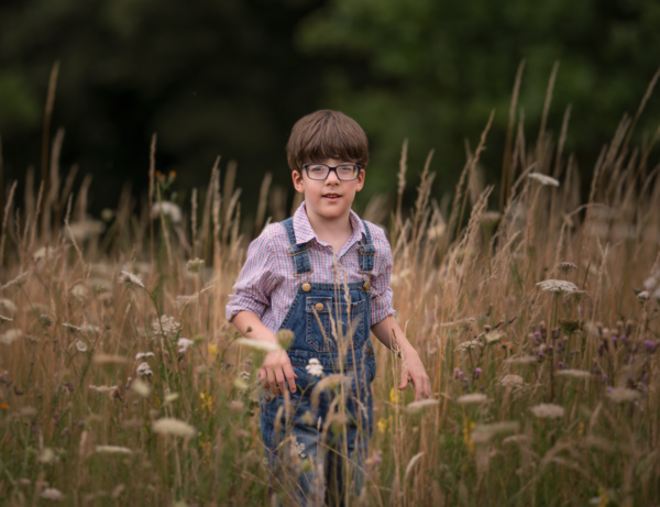 boy in cornfield outdoor photography session