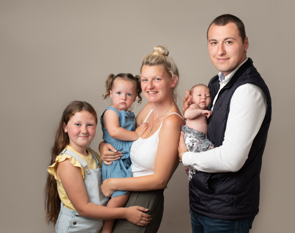 three kids and mother and father family photoshoot
