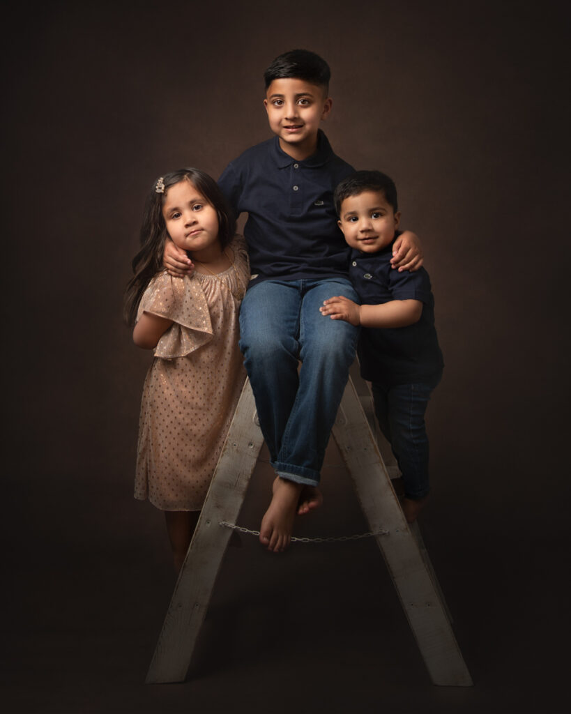 Three siblings two boys and one girl photoshoot