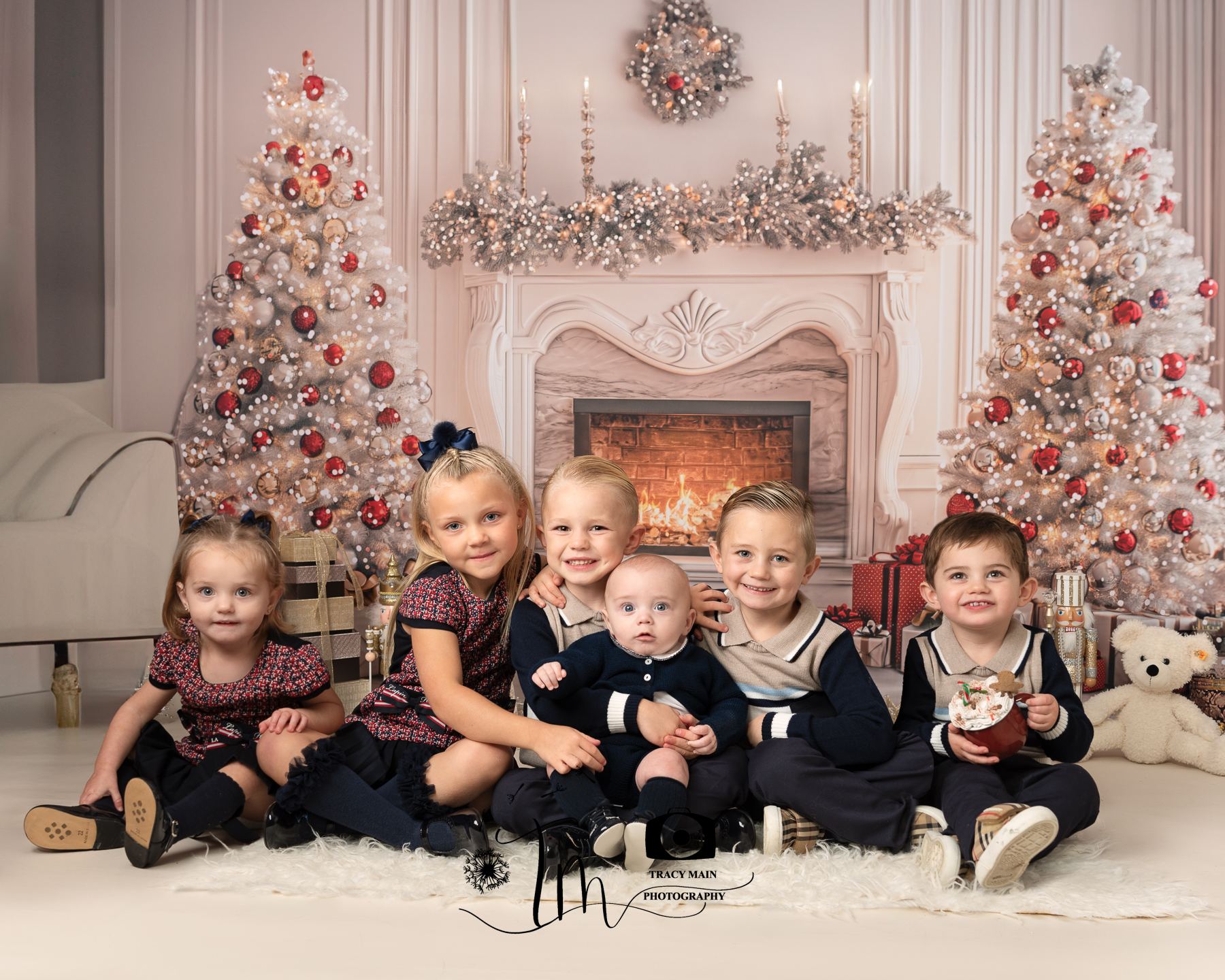 Six children in matching outfits at Christmas photoshoot